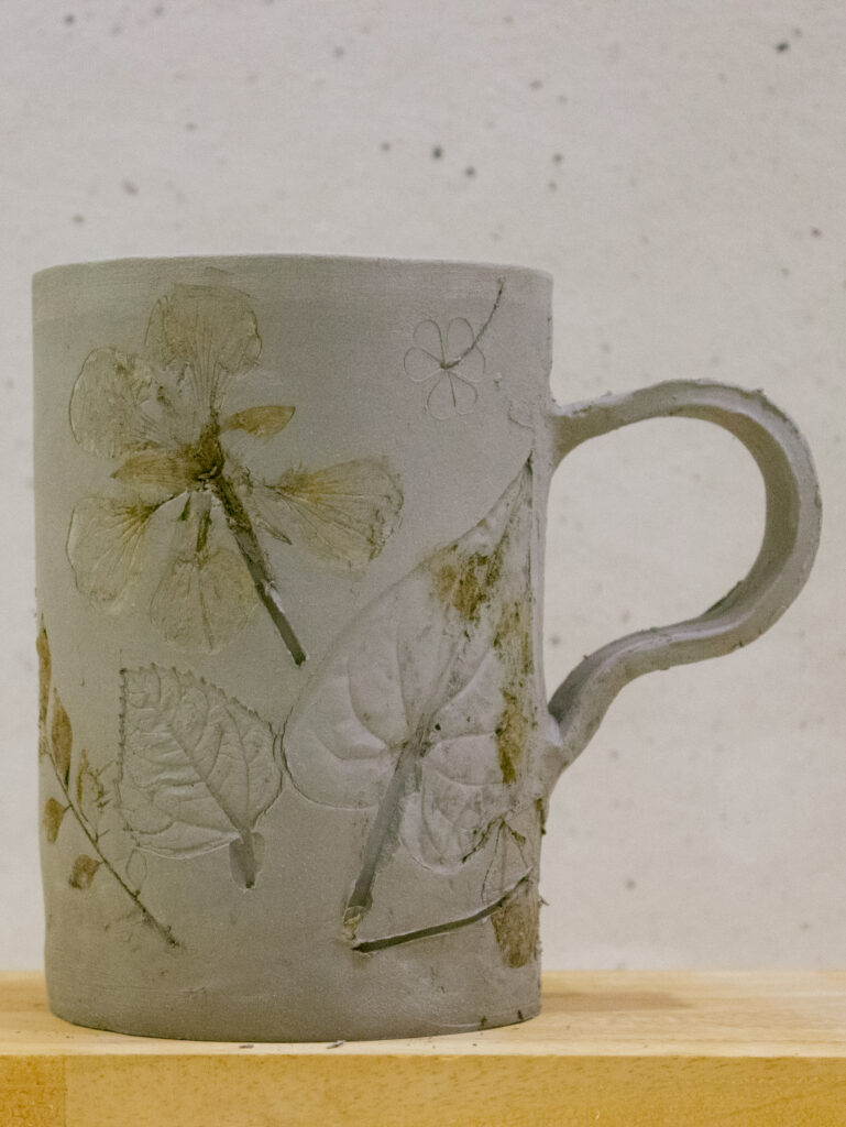 Feb 2025 Delhi In person Pottery Workshop Handmade Floral Clay Cup Ceramic Mug Right Profile